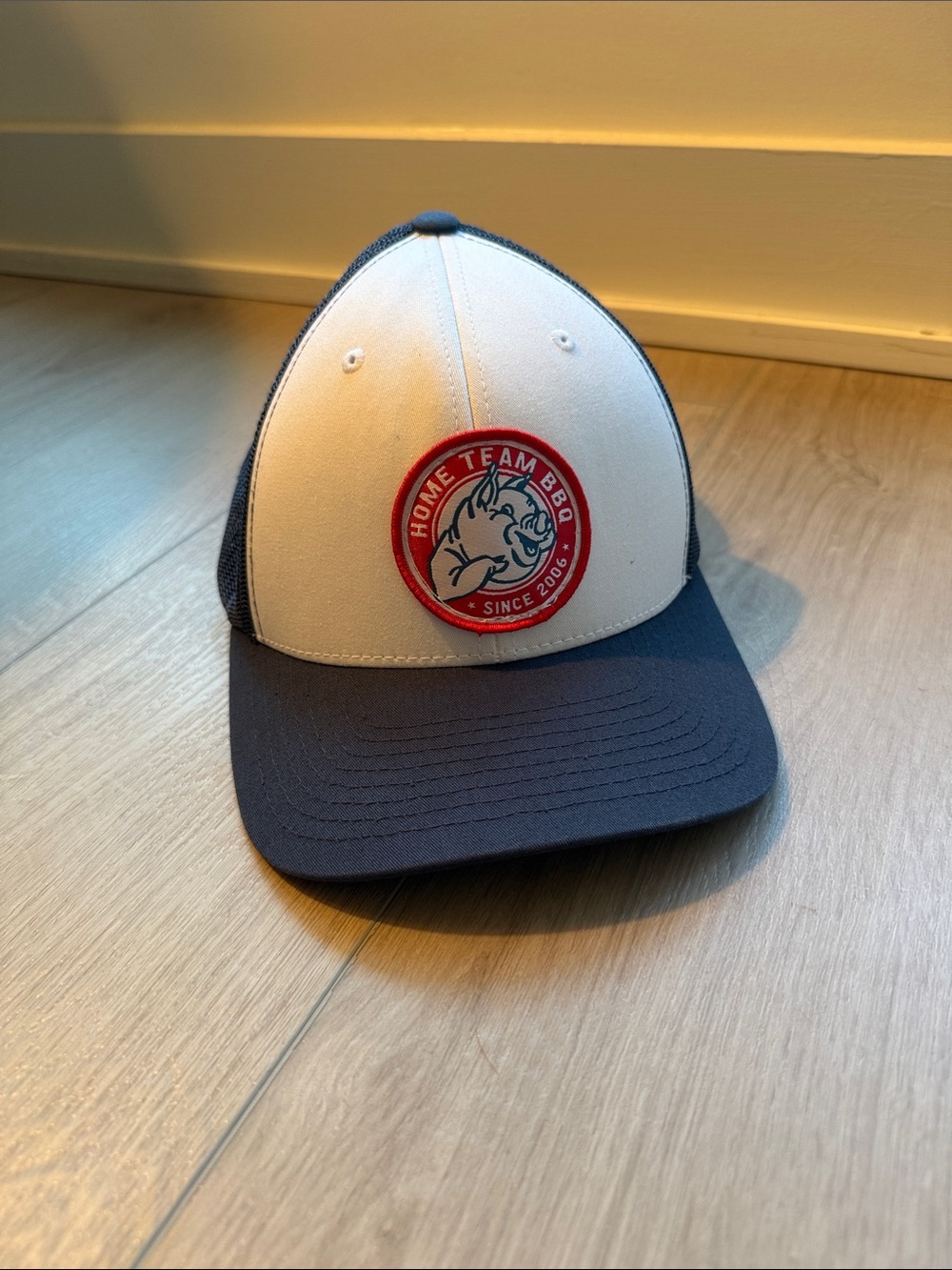Home Team BBQ navy and white trucker hat